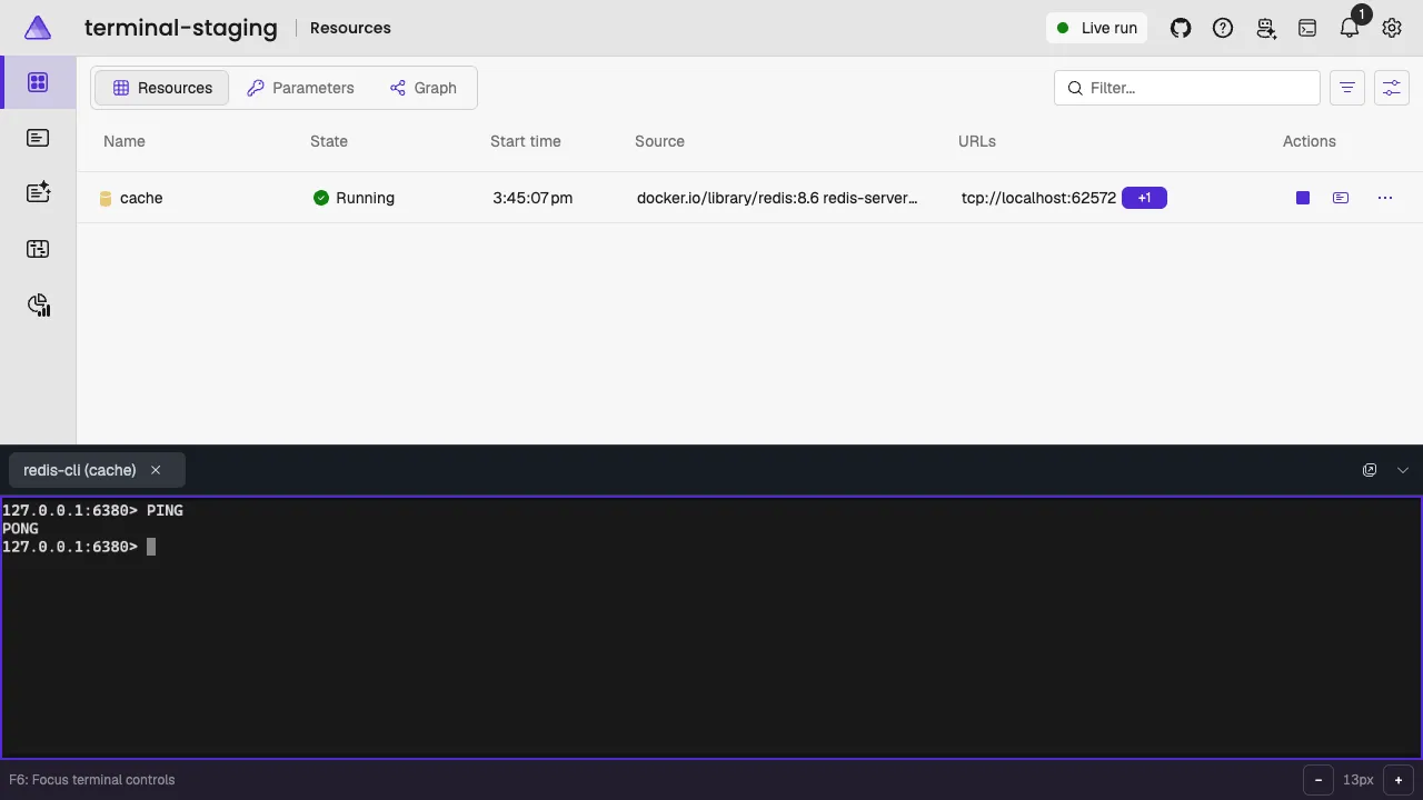 Aspire dashboard with the cache resource running and a redis-cli dock tab showing PING followed by PONG.