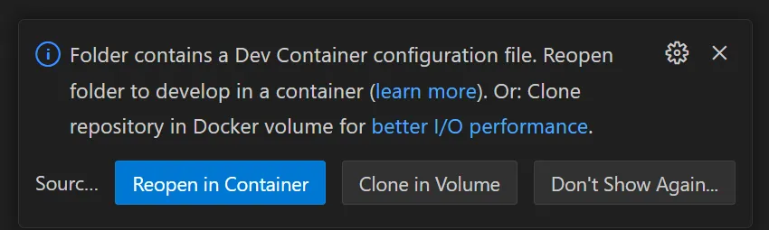 Screenshot showing VS Code prompt to open the repository inside a container.