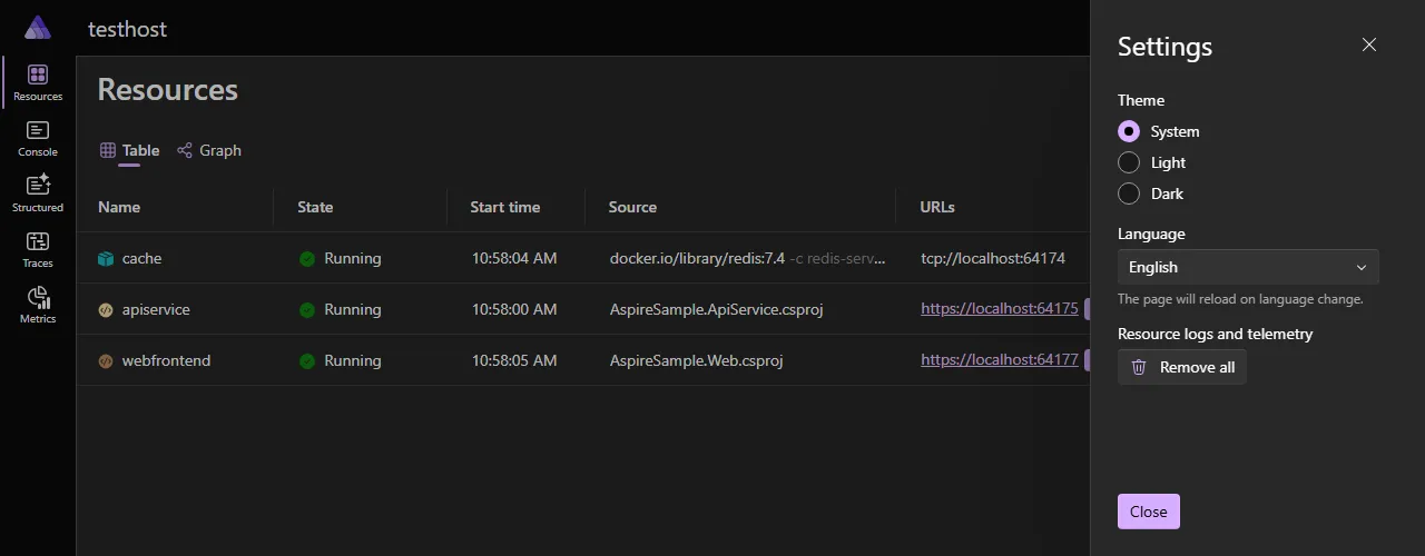 The Aspire dashboard Settings dialog, showing the System theme default selection.